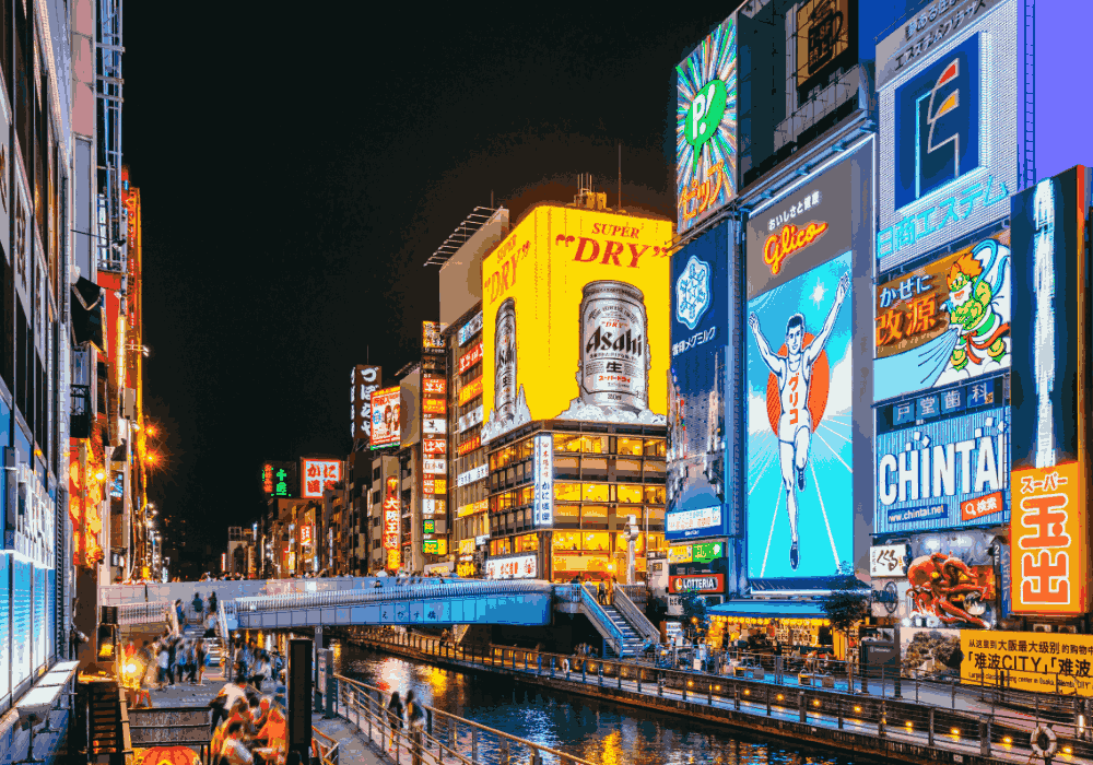 Osaka walking tour through busy streets and famous landmarks in Japan