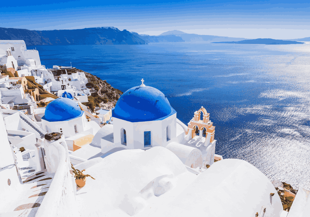 Santorini walking tour through whitewashed villages and coastal views in Greece